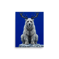 'The Horned Bear' — a Surrealism,Expressionism print. A white polar bear with deer antlers sitting on a snowy rock against a bright blue background, perfect for an eclectic living room.