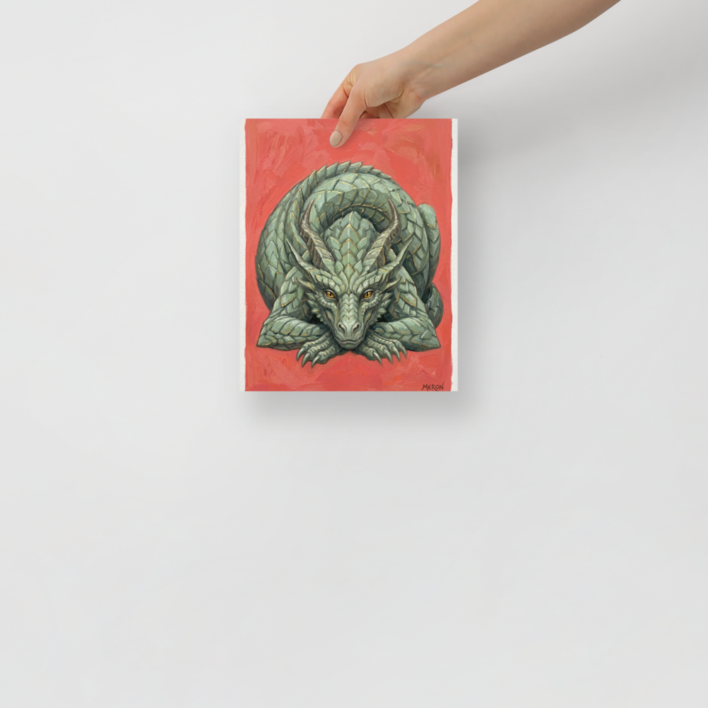 'Slumbering Drake' — a Fantastic realism print. A detailed painting of a green dragon sleeping against a warm red background, perfect for a cozy Library or Nursery.