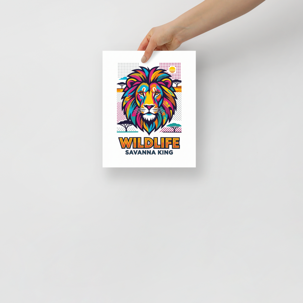 'Savanna King Wildlife' — a Pop art print. A vibrant pop art graphic of a lion's head set against a stylized savanna landscape with the text WILDLIFE SAVANNA KING, perfect for a playful office or game room.