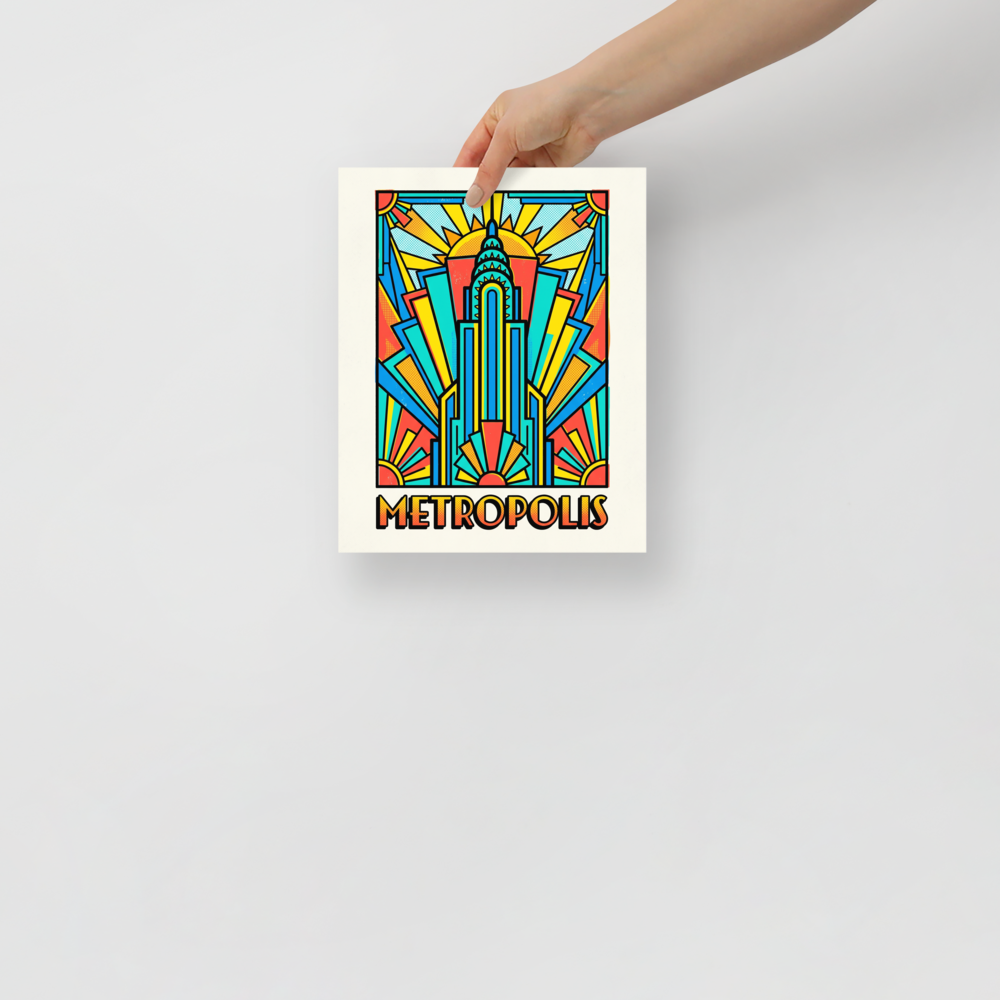 'Metropolis Deco' — a Pop art print. A vibrant pop art poster of an Art Deco skyscraper with sunbursts and the text METROPOLIS, perfect for a stylish home office or living room.