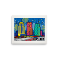 'City Commute Pop' — a Pop art print. A colorful pop art print of a city skyline with geometric buildings and traffic on the street below, perfect for a modern office or living room.