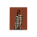'Houndstooth Elegance' — a Figurative art,Realism print. A digital art fashion portrait of a stylish Black man wearing a black and cream houndstooth coat against a warm brown background, adding modern flair to an office or living room.