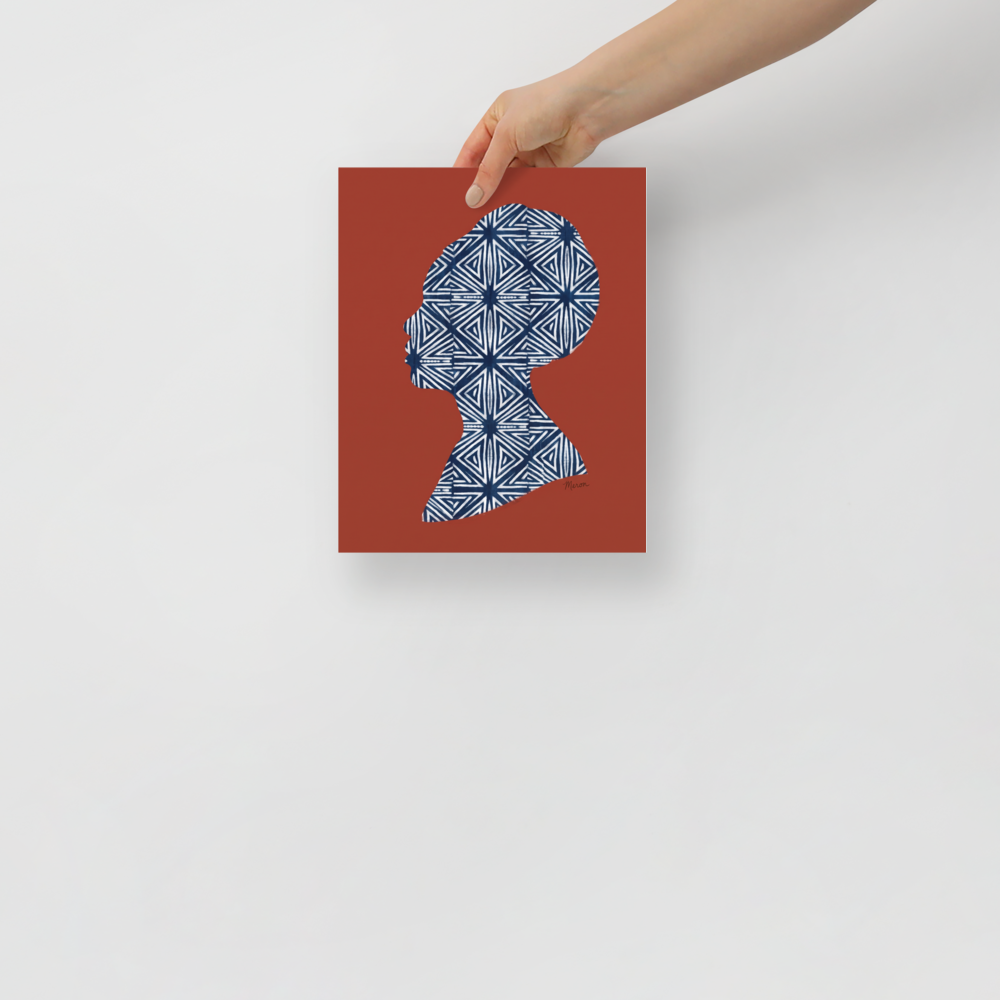 'Indigo Heritage' — a Figurative art,Minimalism print. Profile silhouette of a woman filled with a white and navy geometric indigo pattern against a rust red background, perfect for Bedroom wall decor.
