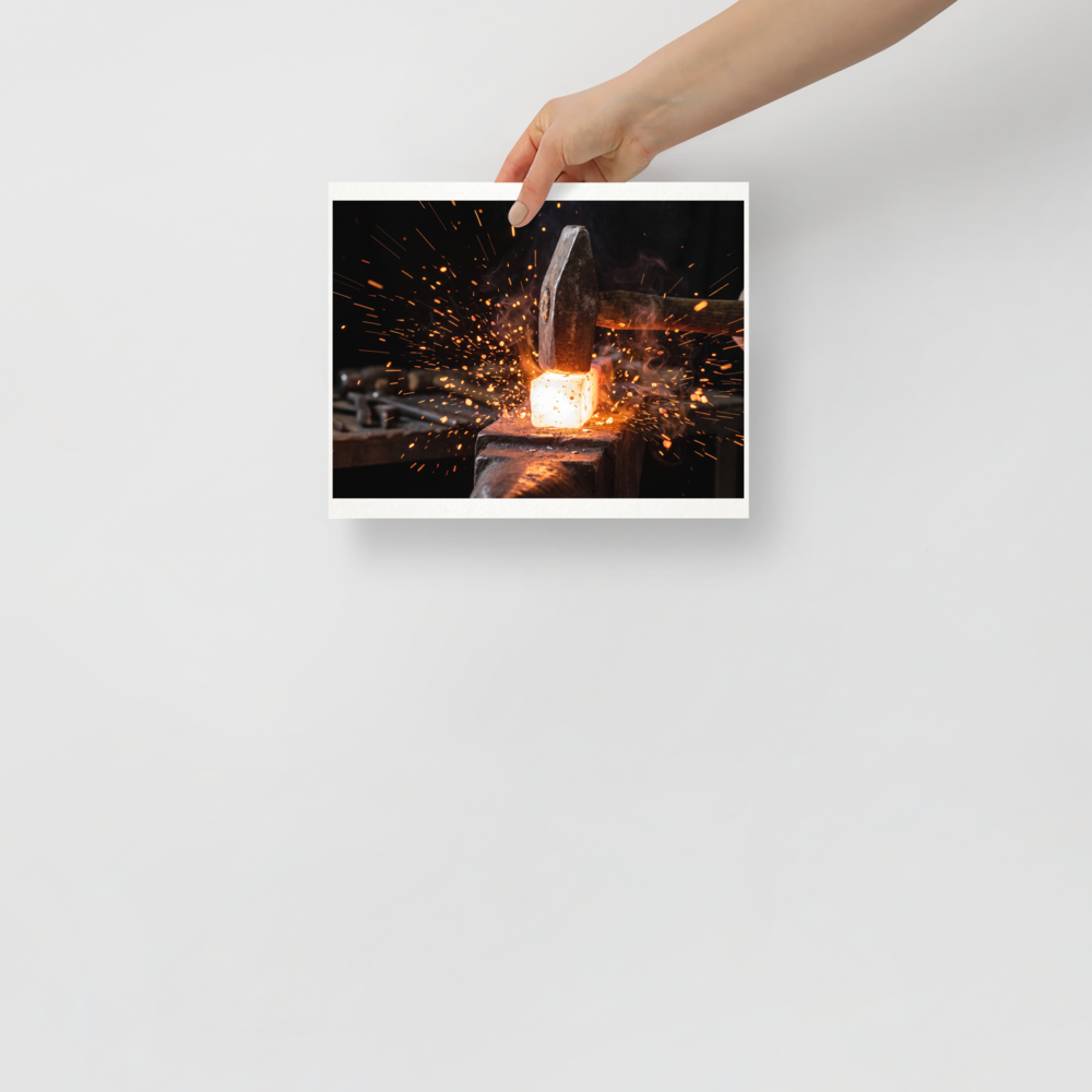 'Strike of the Anvil' — a Art photography print. Close-up photograph of a blacksmith hammer striking red-hot metal on an anvil with glowing sparks, dynamic art for a garage or office.