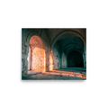 'Arches at Sunset' — a Art photography print. Ancient stone arches illuminated by warm sunset light with cool shadowed corridors, elegant architectural art for a hallway.