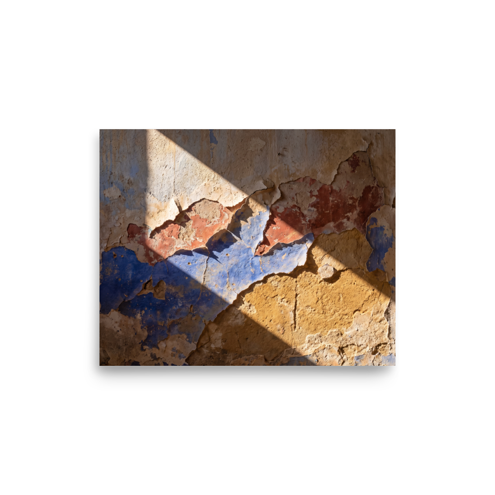 'Palimpsest in Sunlight' — a Art photography print. A photographic study of peeling plaster wall showing layers of blue, red, and ochre paint under bright diagonal sunlight, suitable for a rustic or modern living room.