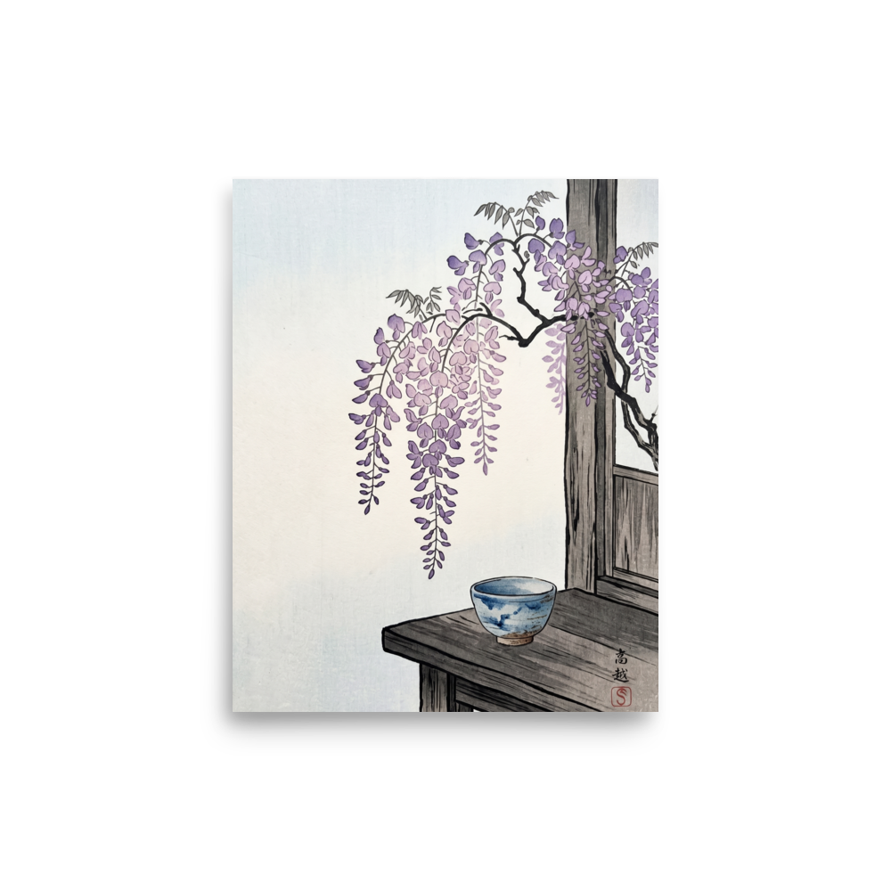 'Wisteria and Tea' — a Shin hanga print. Cascading purple wisteria blossoms hang above a traditional blue ceramic tea bowl on a rustic wooden table, ideal for a serene dining room.