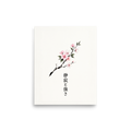 'Sakura in Bloom' — a Shin hanga print. A single cherry blossom bough with pastel pink flowers and Japanese calligraphy on crisp textured paper, ideal for a tranquil bedroom.