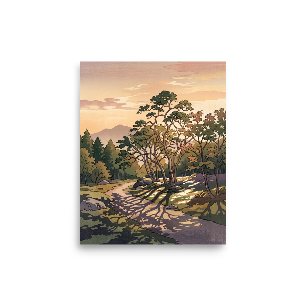 'Dappled Sunset Path', part of Meron's Shin hanga wall art. A winding forest path dappled with tree shadows leads toward distant mountains under a warm peach evening sky, ideal for a tranquil living room.