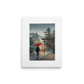 'Sanctuary in the Rain' by Meron. A person holding a red umbrella walks along a rain-slicked stone path toward an illuminated shrine gate in misty woods, ideal for a calm living room. A Shin hanga wall art print.