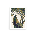 A tranquil painting of a cloaked figure sitting peacefully beneath the green branches of an olive tree, creating a calming centerpiece for a bedroom or meditation space. A Les Nabis print with a tempera look, titled 'Beneath the Olive Tree'.