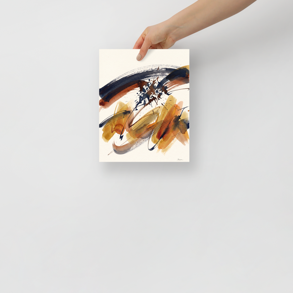 An abstract watercolor composition with sweeping ochre and navy ink strokes against a textured cream background in a living room. 'Sienna Momentum', a Abstract art print for the wall.