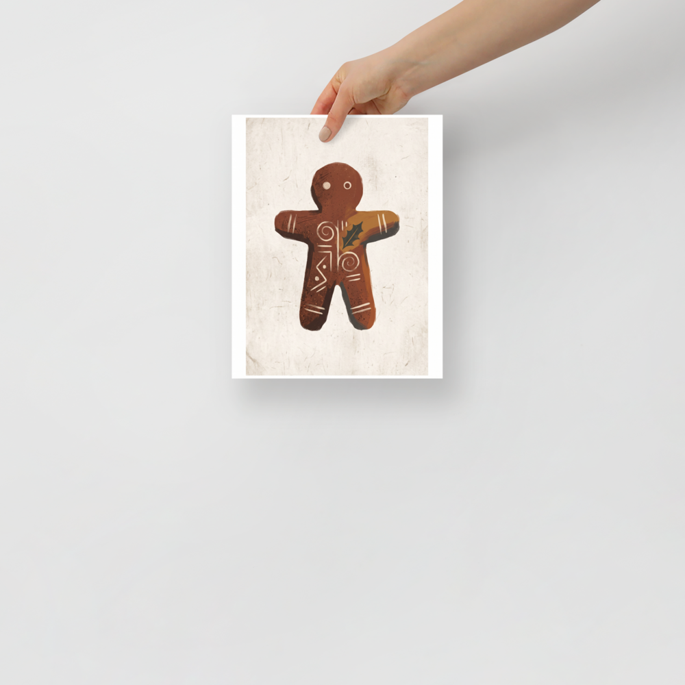 Wall art print 'Gingerbread Rune' in a Folk art style. A minimalist folk illustration of a gingerbread figure with holly leaves on parchment paper for kitchen wall art.