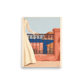 'Coastal Balcony Breeze', Modernism wall art in dark salmon and royal blue. Woman in an ivory lace dress leaning on a wrought iron balcony overlooking a blue sea with a sailboat, ideal for a bedroom.