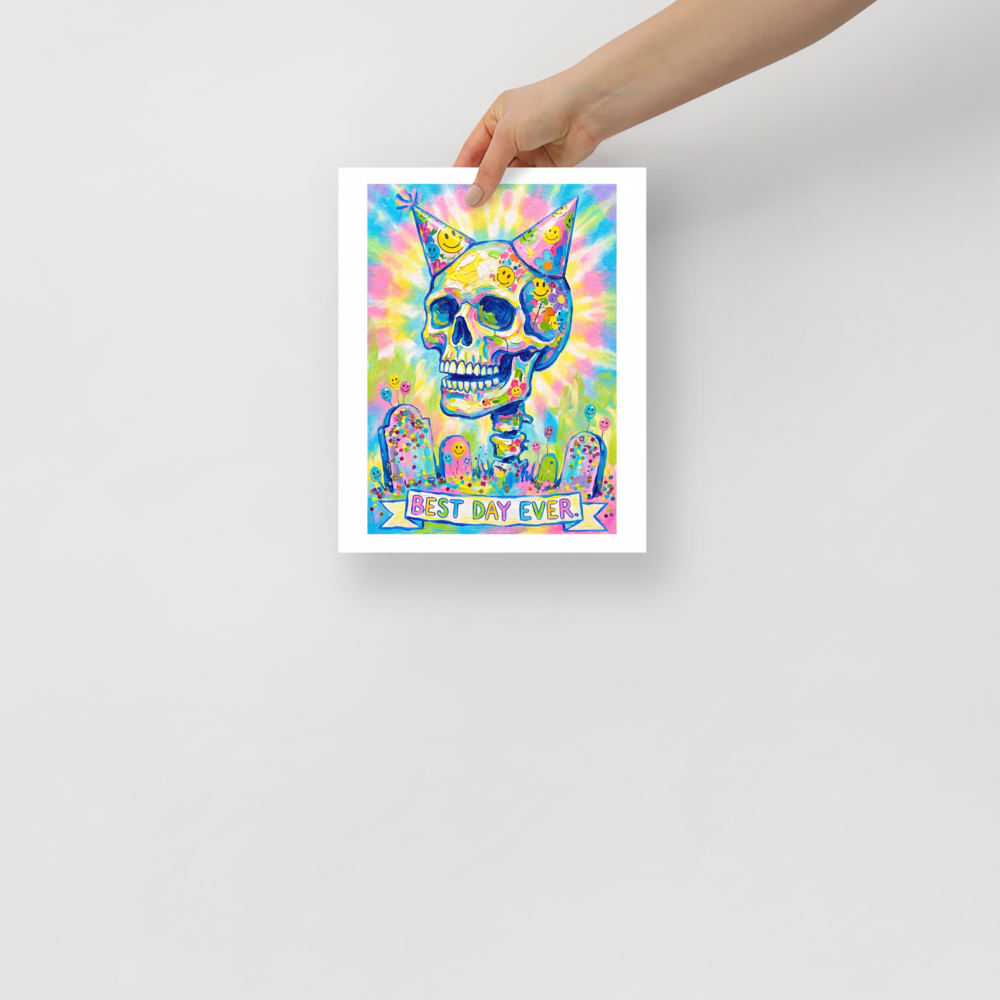 A vibrant impasto painting of a colorful skull with two party hats surrounded by confetti and tombstones above a banner reading Best Day Ever, ideal for a lively living room or game room. A psychedelic / cosmic piece titled 'Best Day Ever'.