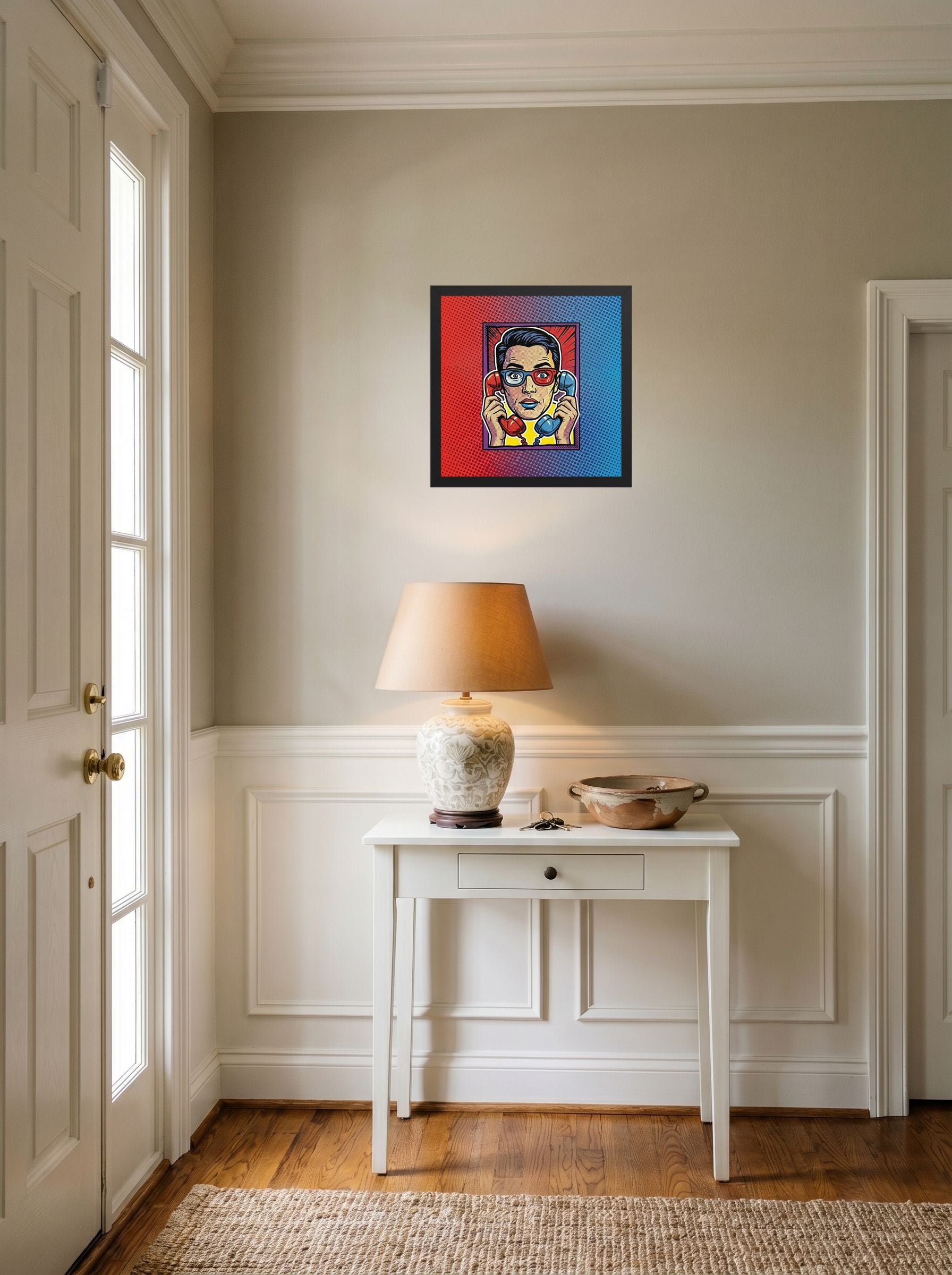 A 14x14 inch black framed Pop art print of 'Bipartisan Static' hanging in an entryway near a console.
