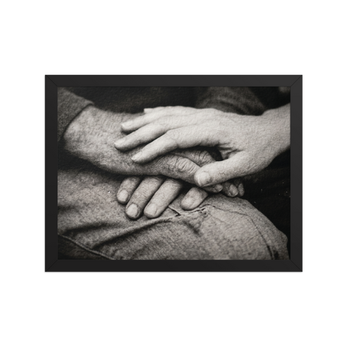 'A Lasting Touch' — a Art photography print. A black and white close up photograph of two older hands gently intertwined on a person's lap, perfect for adding warmth to a bedroom.