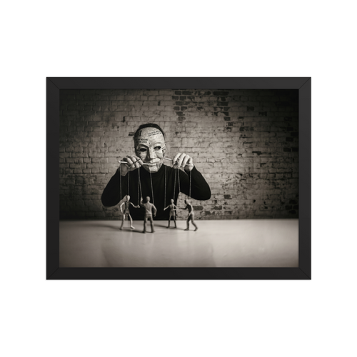 'The Puppeteer of News' — a Surrealism print. Conceptual sepia photograph of a person in a newspaper mask acting as a puppeteer, controlling small human figures on strings against a brick wall, ideal for a moody den or office.