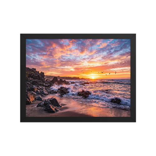 'Coastal Fire' — a Art photography print. A vibrant photograph of a sunset over a rocky beach with crashing waves and birds flying in the distance, a beautiful piece for a Living Room.