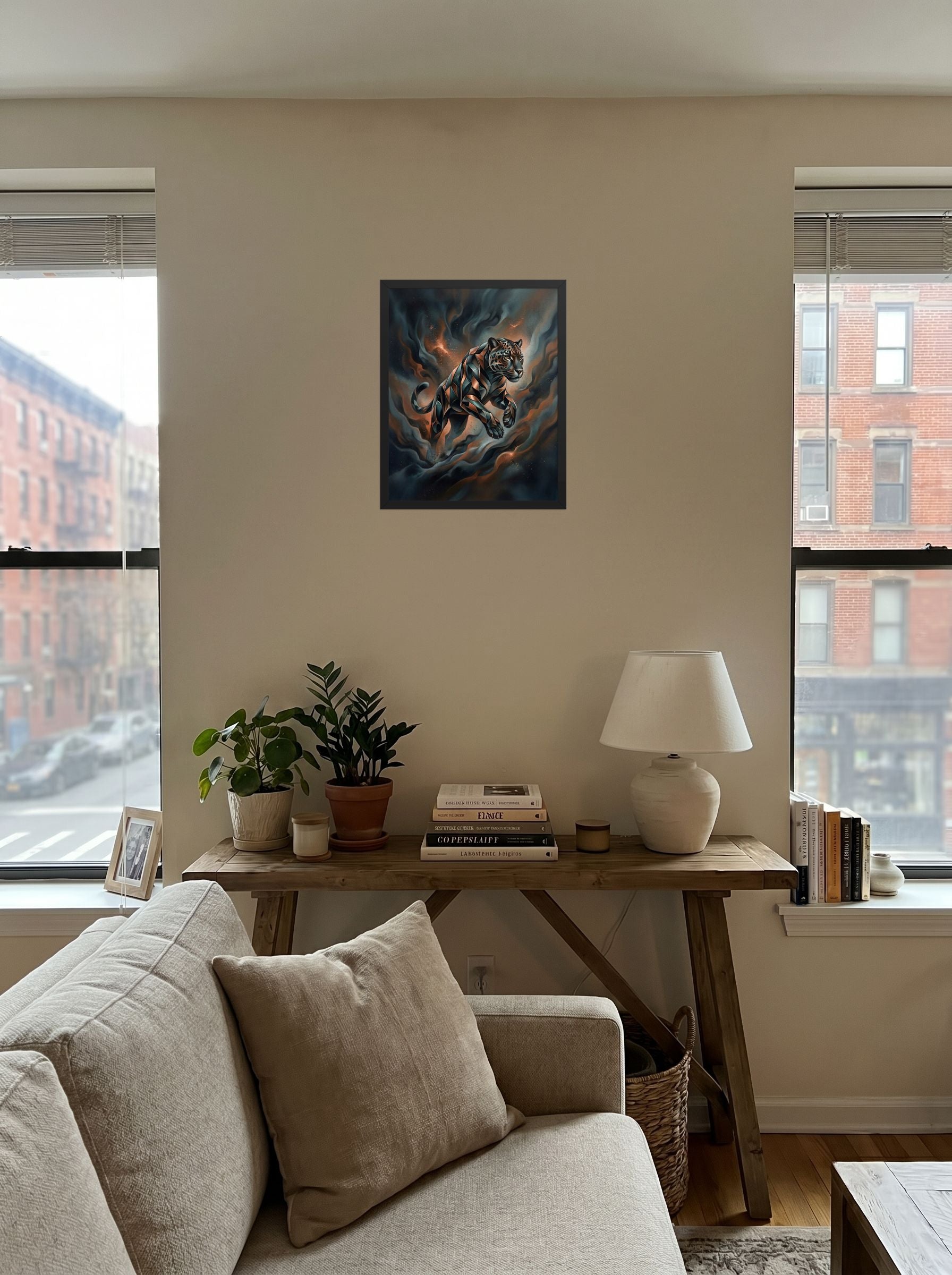A 16x20 inch black framed Digital art print of 'Phantom Leap' displayed in the center of a living room.