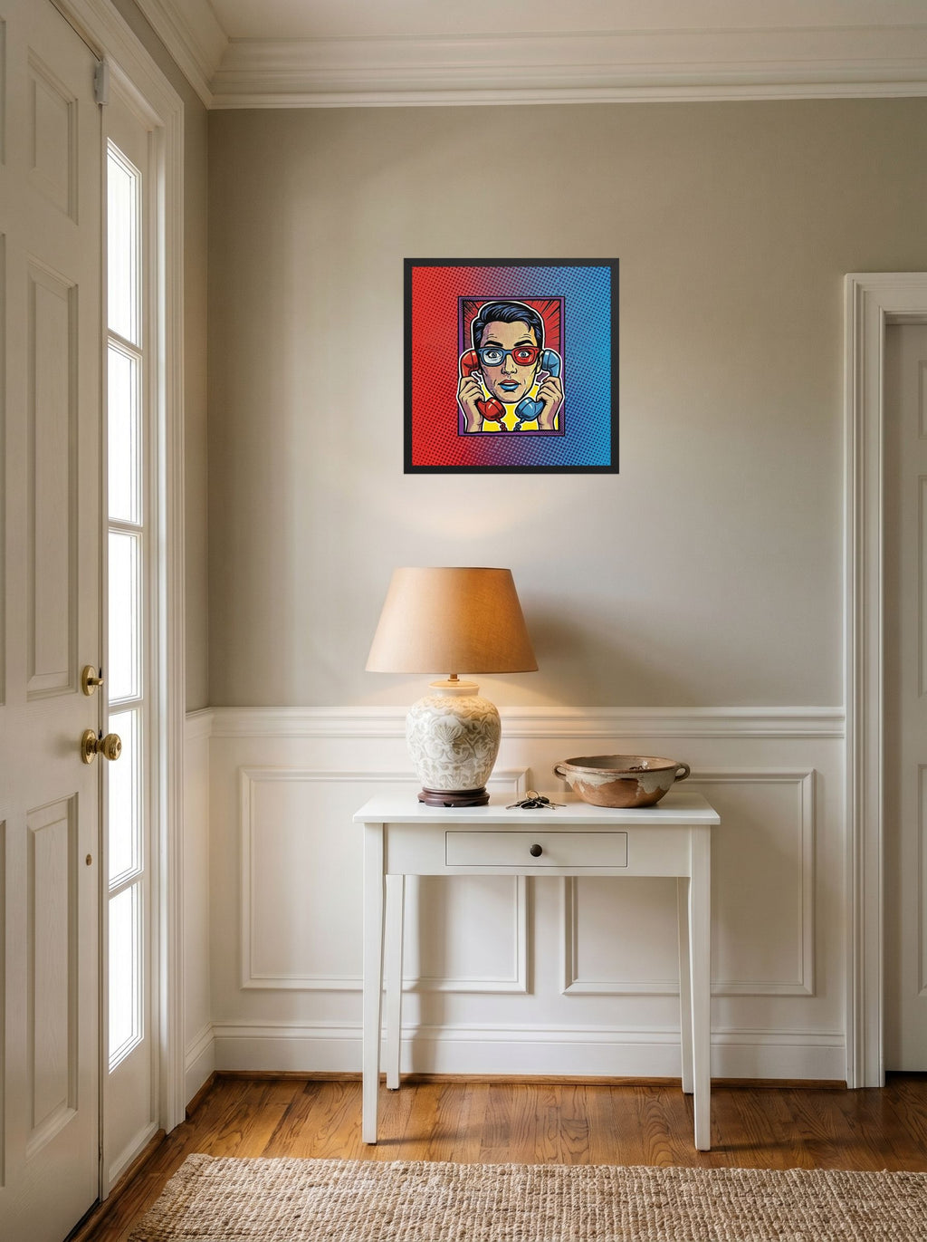 A 18x18 inch black framed Pop art print of 'Bipartisan Static' hanging in an entryway near a console.