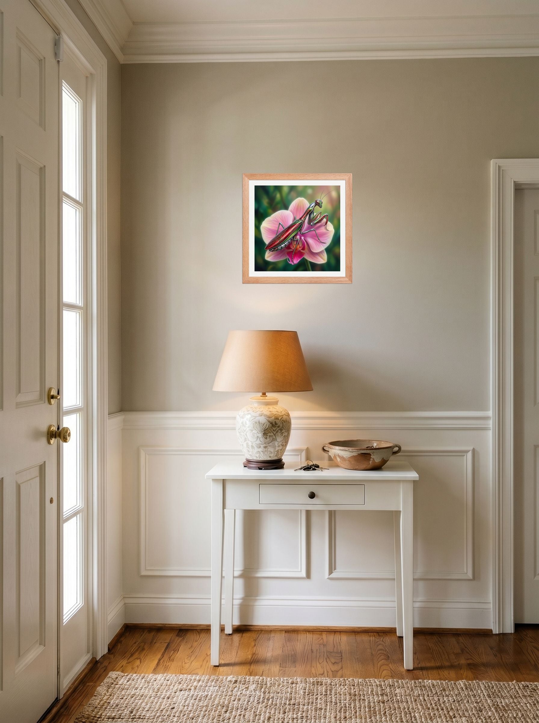 A 12x12 inch redoak framed Surrealism print of 'Chrome Mantis' hanging in an entryway near a console.
