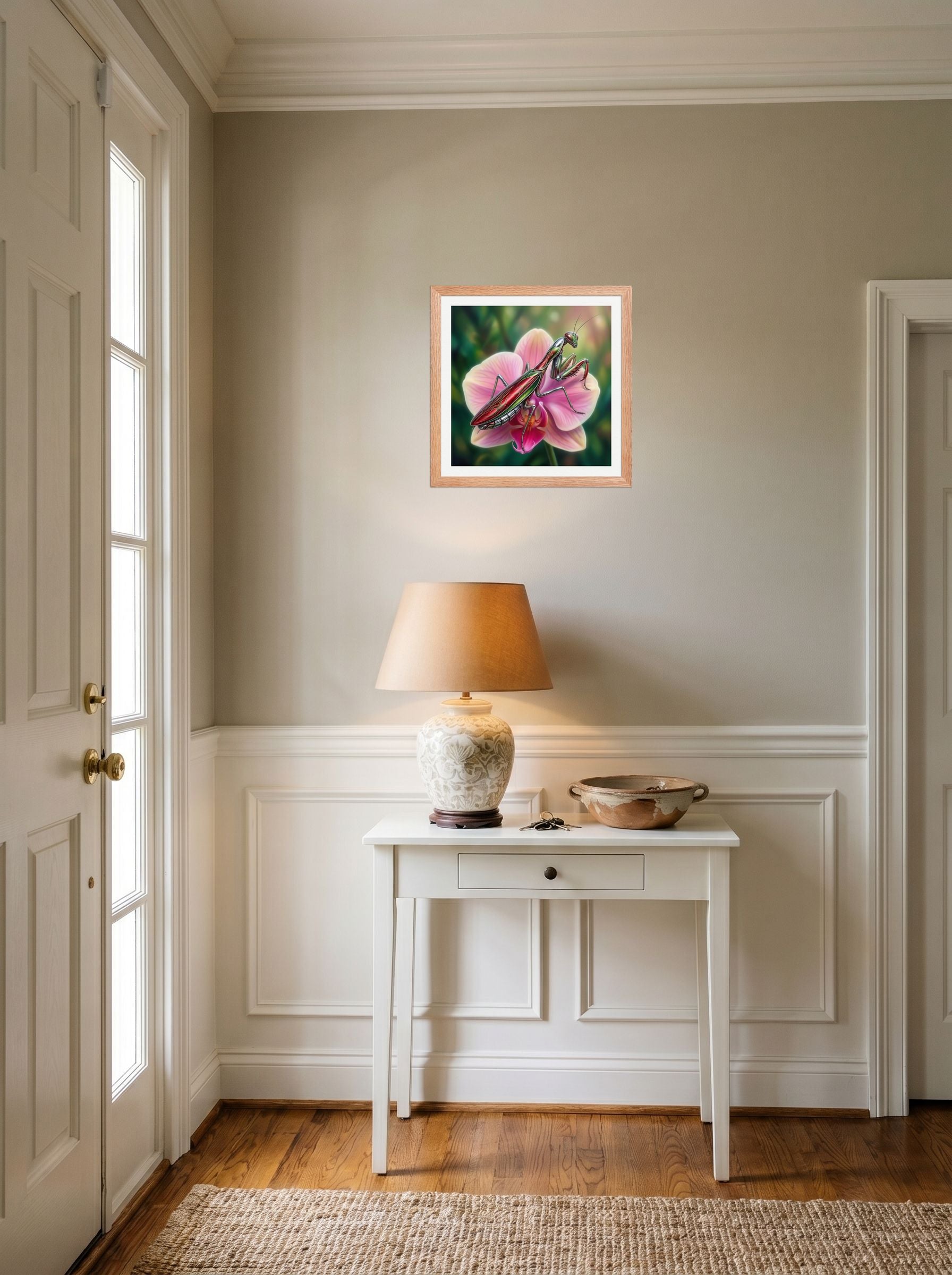 A 14x14 inch redoak framed Surrealism print of 'Chrome Mantis' hanging in an entryway near a console.