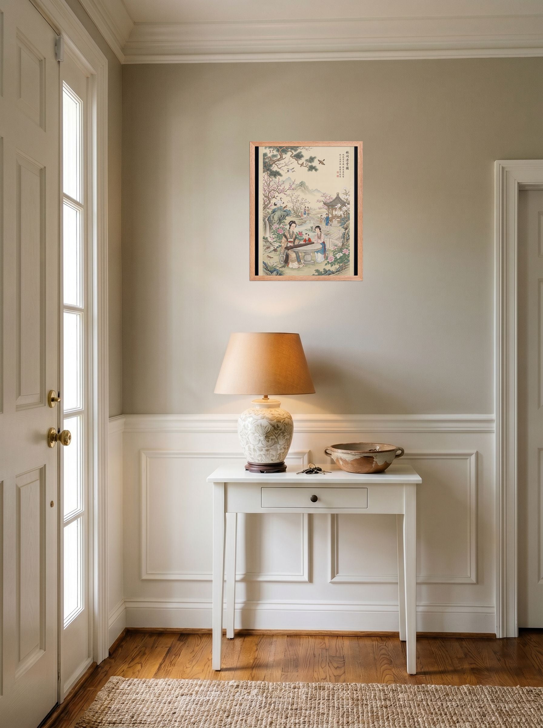 A 16x20 inch redoak framed Fine Art print of 'Melody in the Spring Garden' hanging in an entryway near a console.