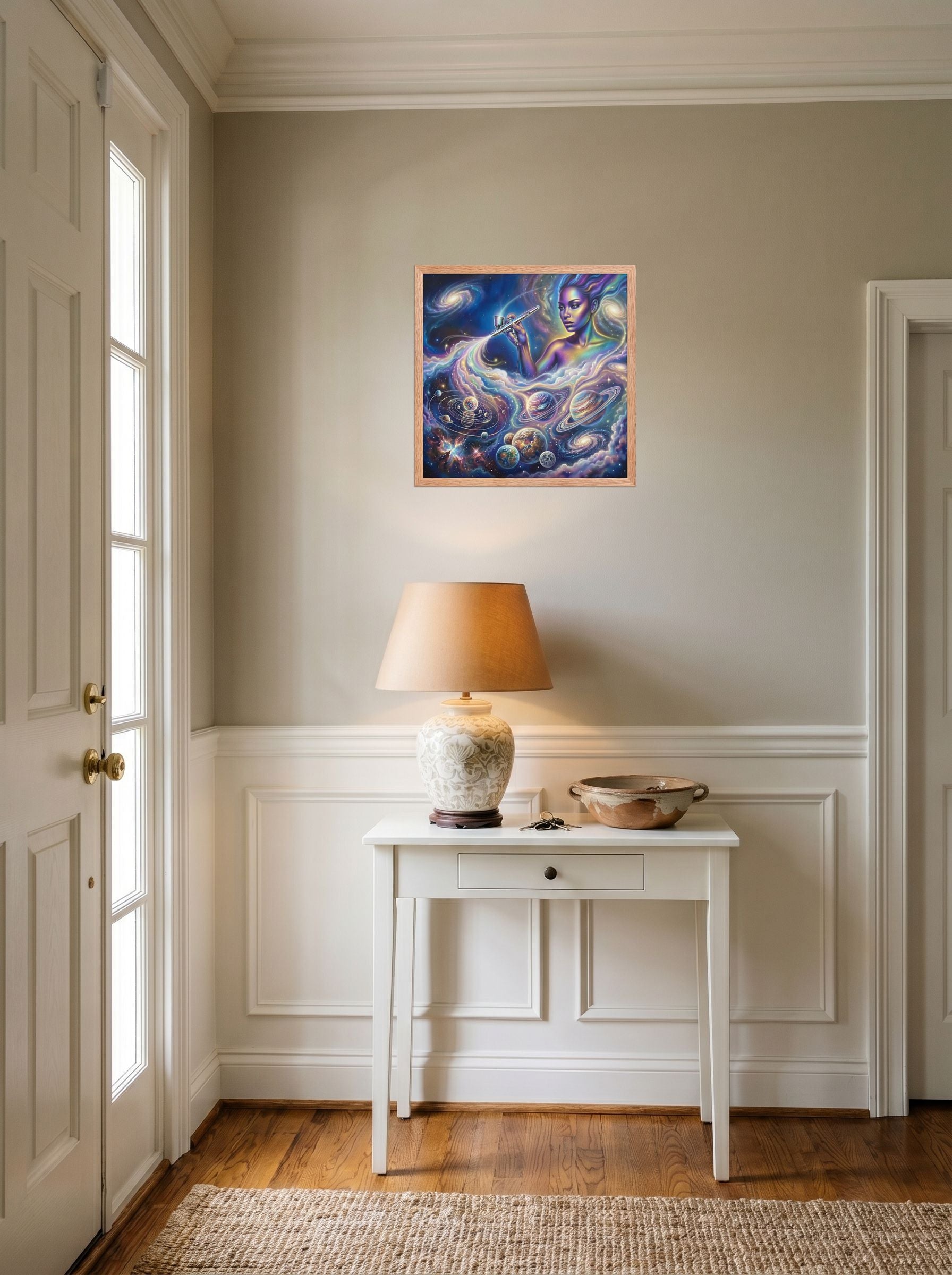 A 18x18 inch redoak framed Space art print of 'The Cosmic Painter' hanging in an entryway near a console.