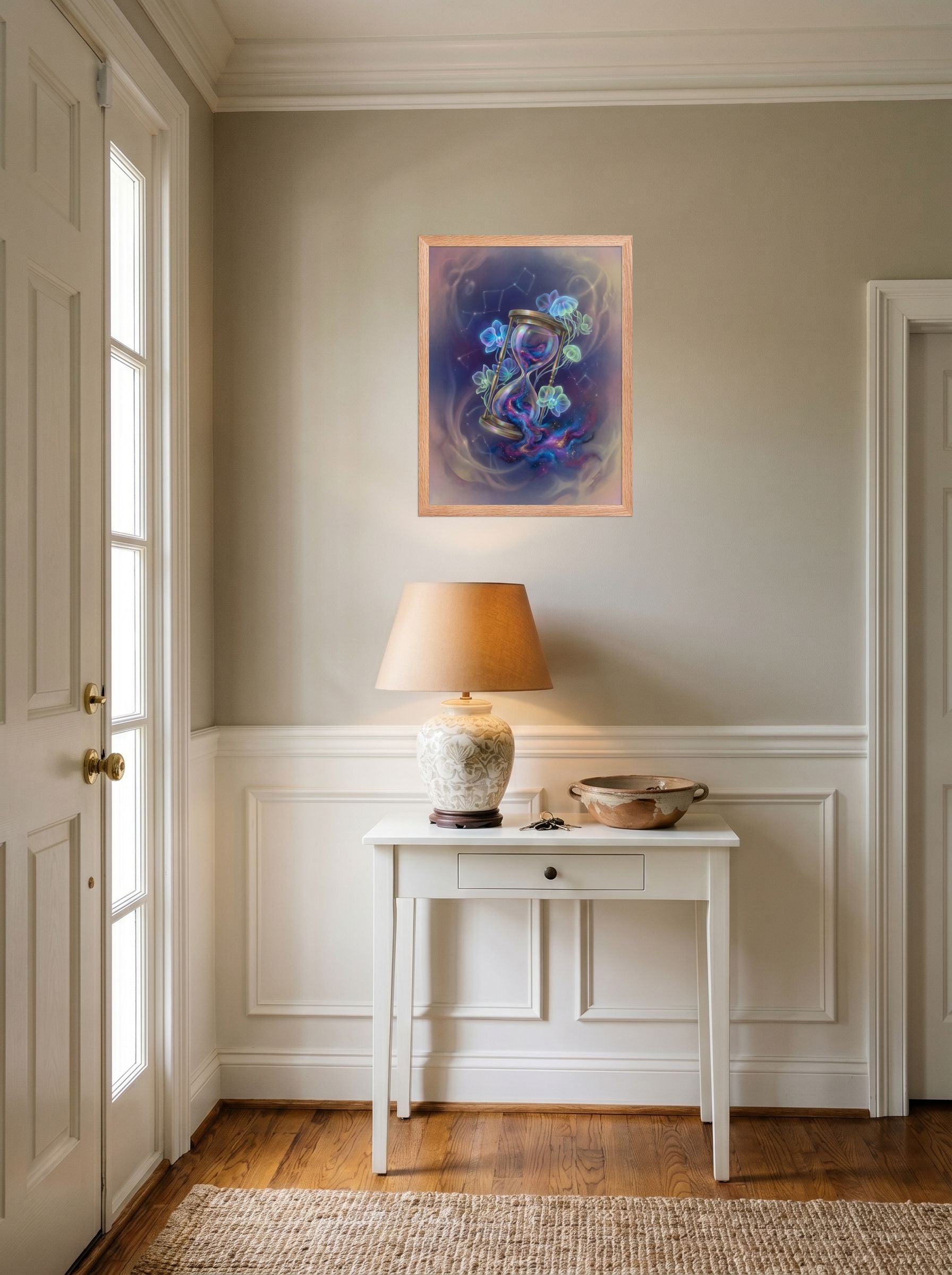 A 18x24 inch redoak framed Magic realism print of 'Sands of the Nebula' hanging in an entryway near a console.