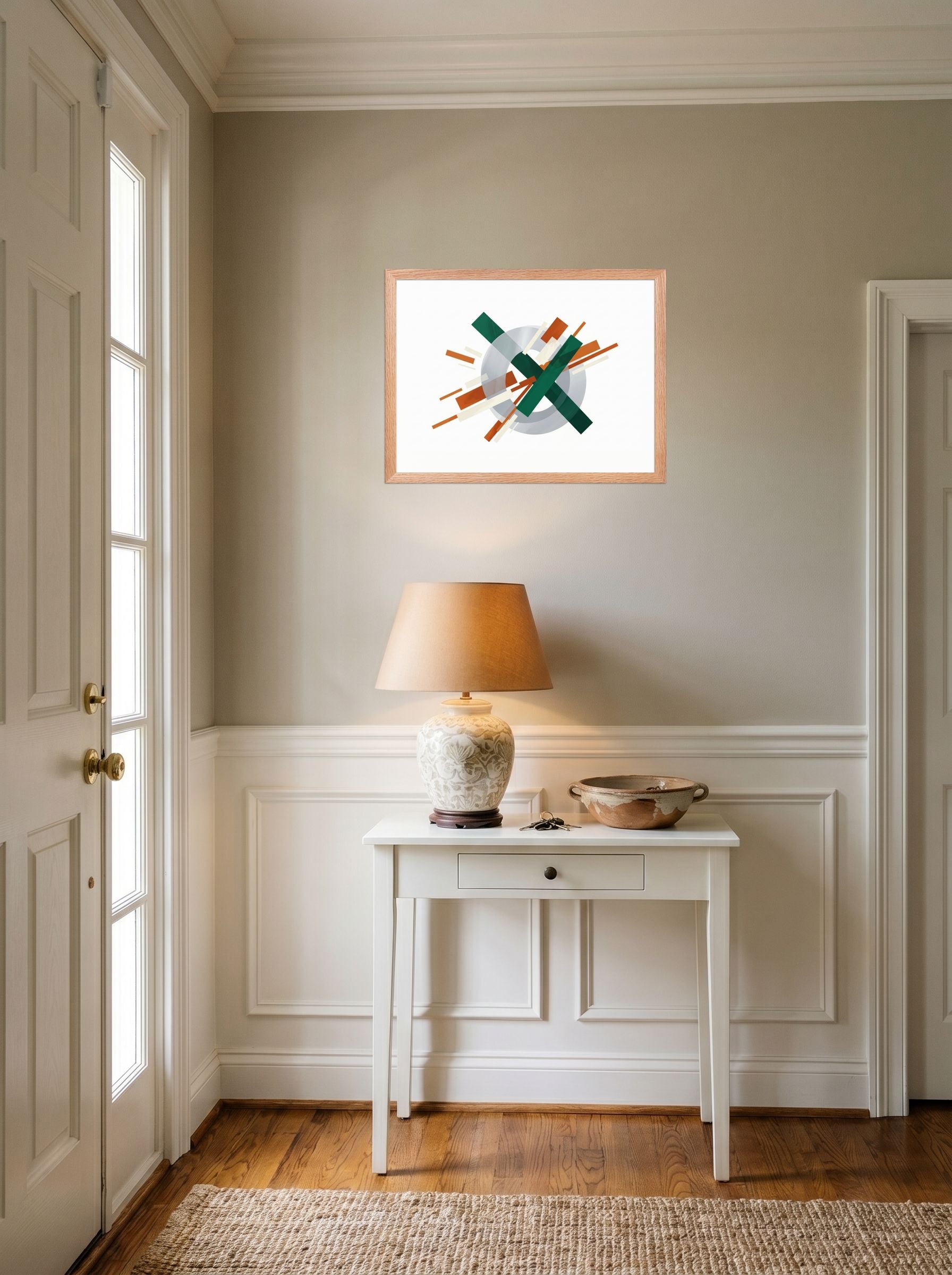 A 24x18 inch redoak framed Suprematism print of 'Intersecting Perspectives' hanging in an entryway near a console.
