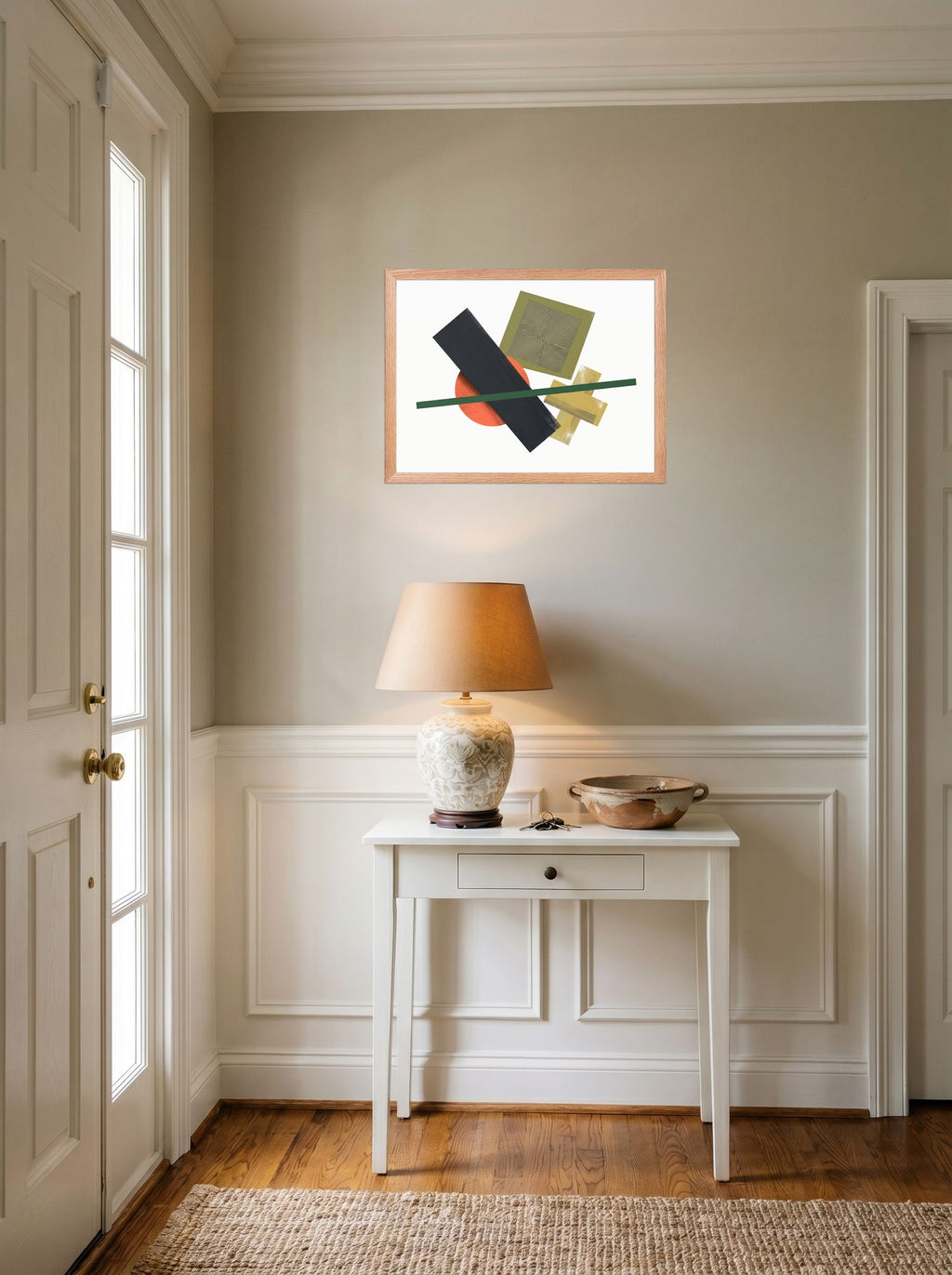 A 24x18 inch redoak framed Suprematism print of 'The Geometry of Sound' hanging in an entryway near a console.