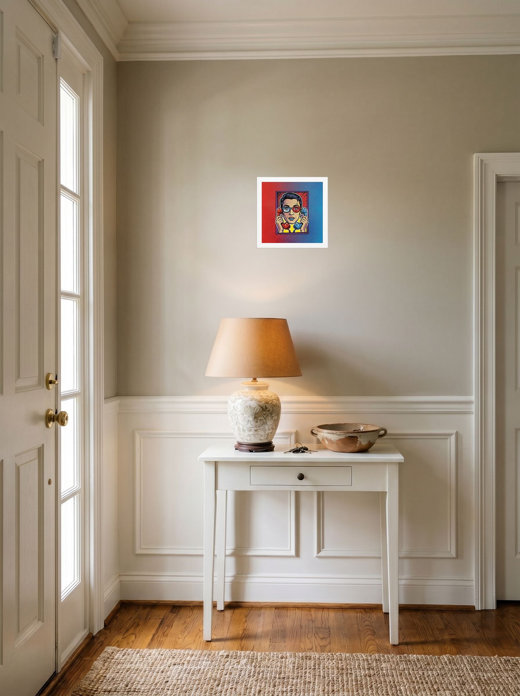 A 10x10 inch white framed Pop art print of 'Bipartisan Static' hanging in an entryway near a console.