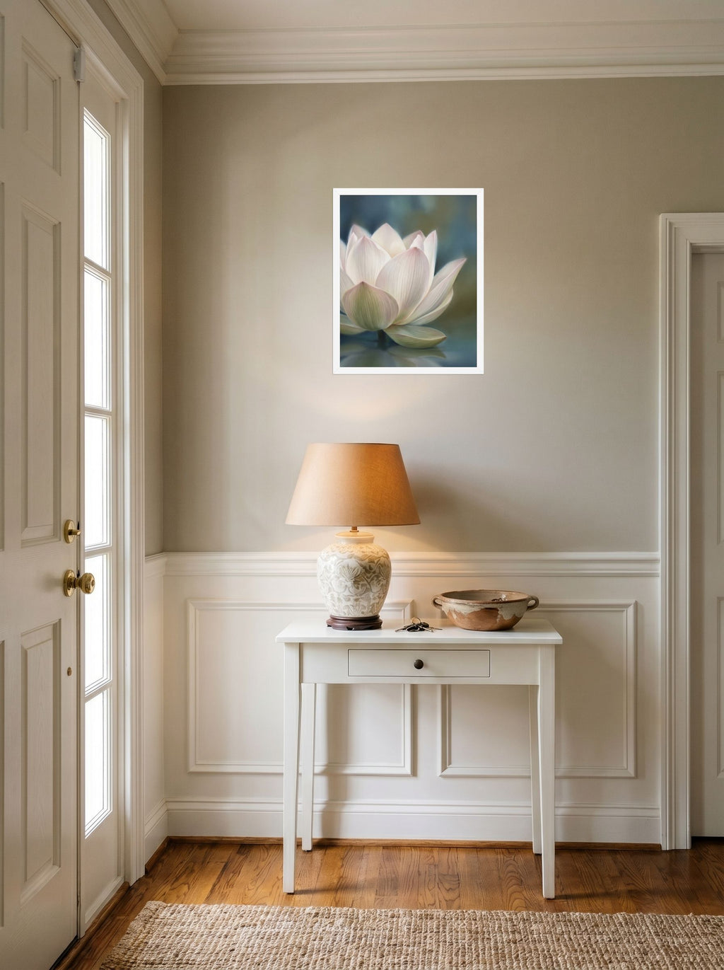 A 16x20 inch white framed Realism print of 'Serene Lotus Reflection' hanging in an entryway near a console.