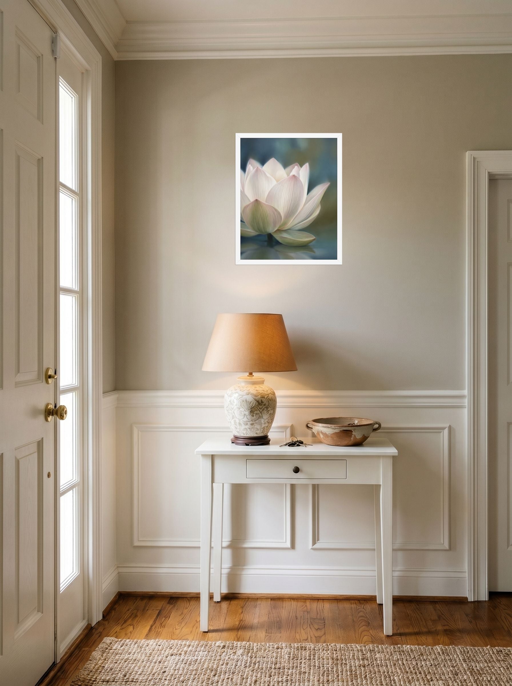 A 16x20 inch white framed Realism print of 'Serene Lotus Reflection' hanging in an entryway near a console.