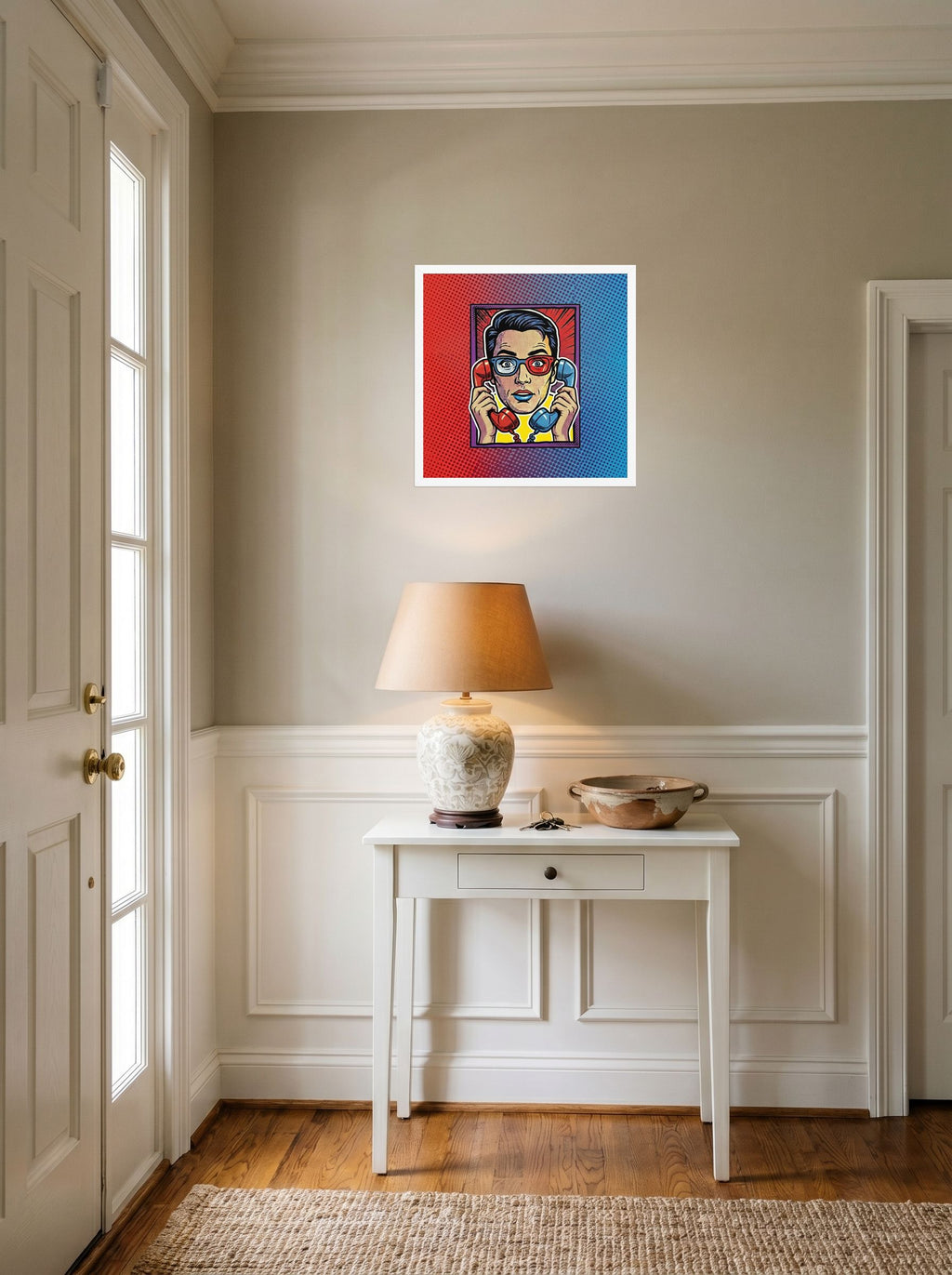 A 18x18 inch white framed Pop art print of 'Bipartisan Static' hanging in an entryway near a console.