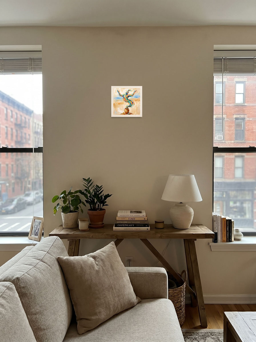 Expressionism wall art 'Rise of the Djinn', unframed paper at 10x10 inch, anchoring a living room seating area.