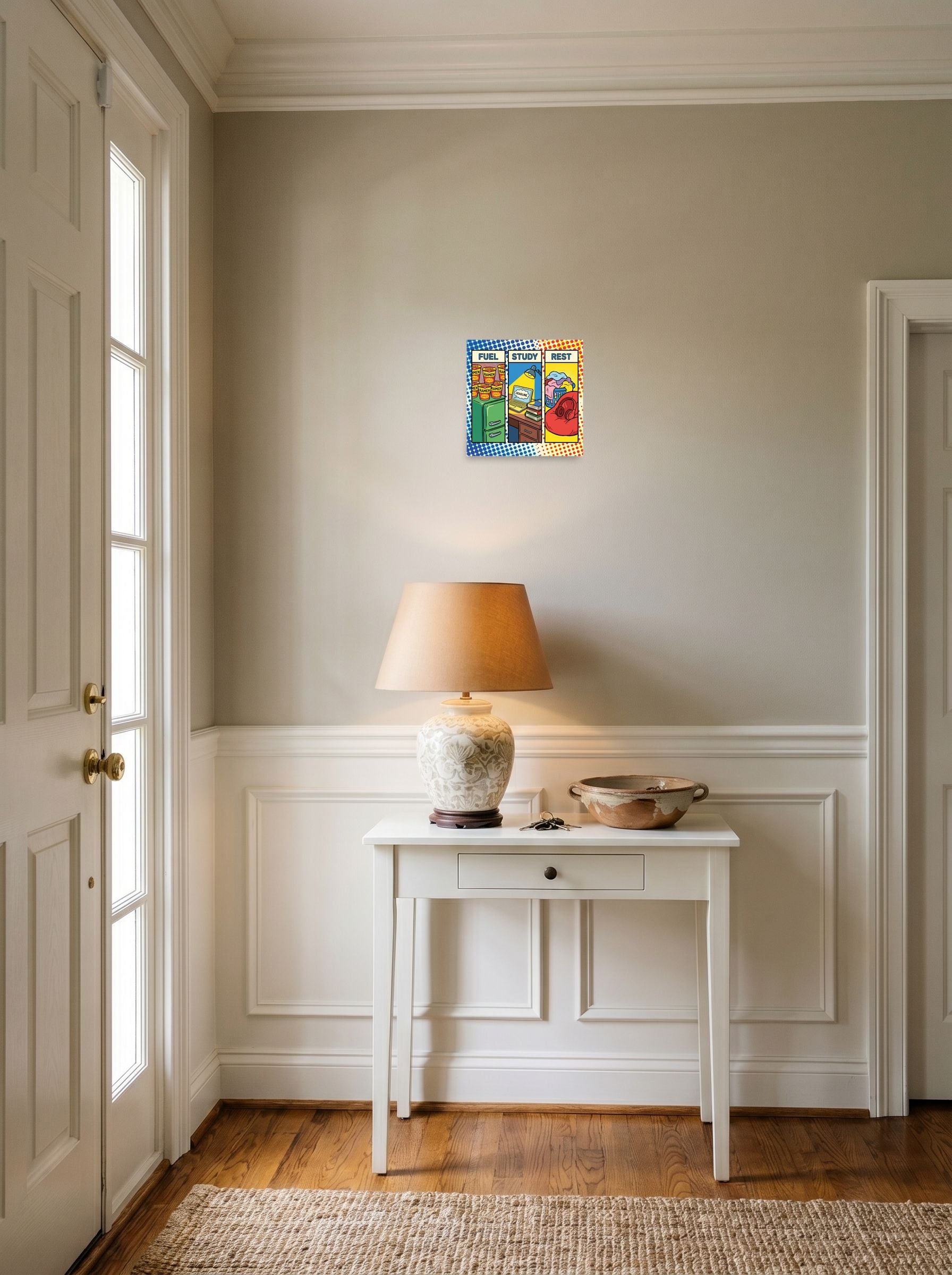 A 10x10 inch unframed paper Pop art print of 'The College Triad' hanging in an entryway near a console.