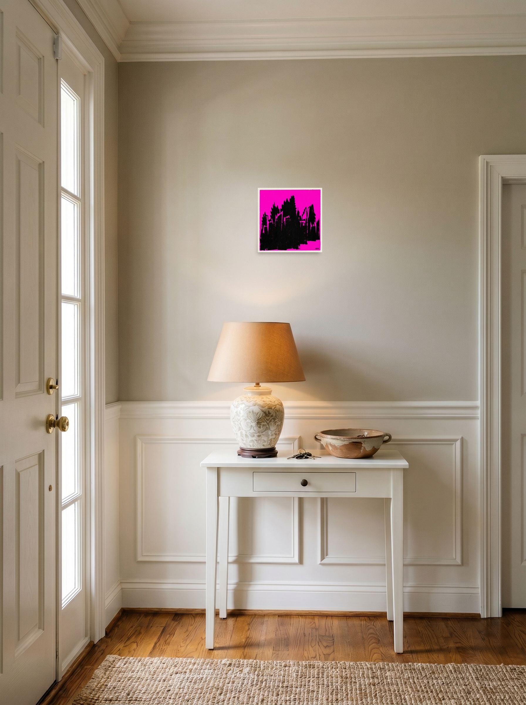 A 10x10 inch unframed paper Pop art print of 'Neon Urban Decay' hanging in an entryway near a console.