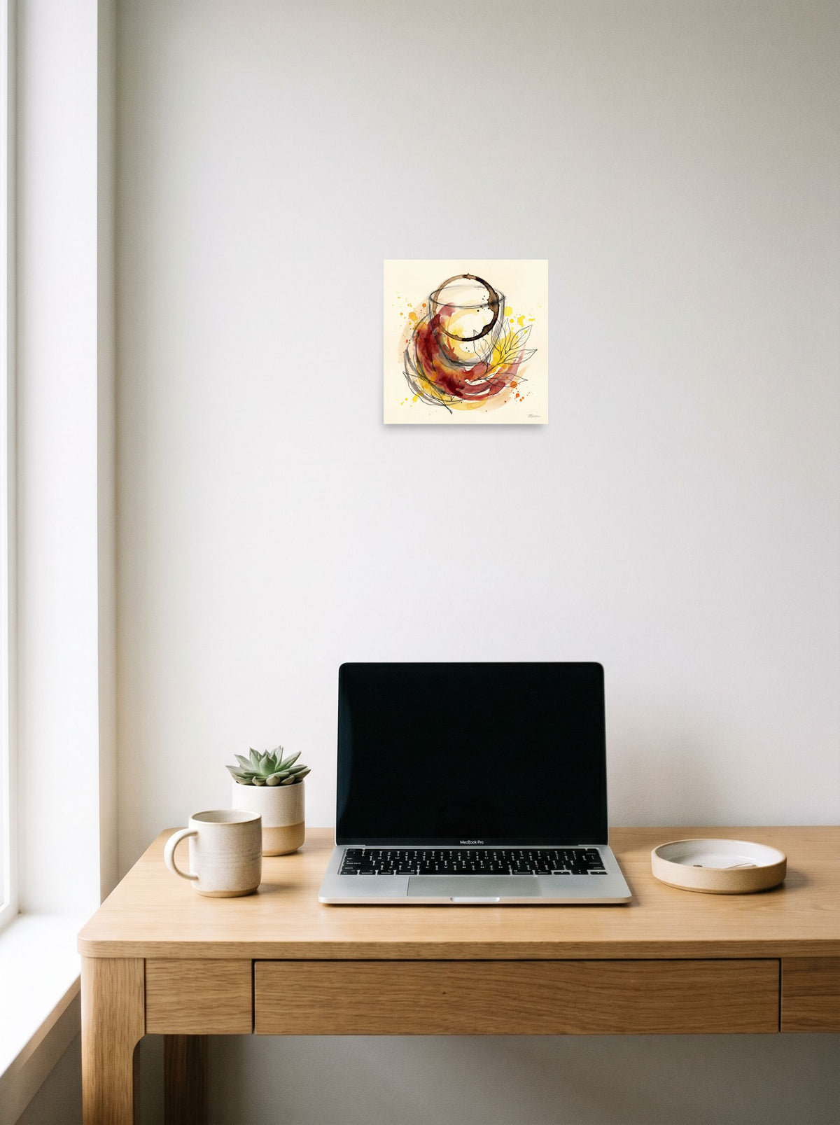 The Fine Art print 'Notes of Cabernet', 10x10 inch unframed paper, styled above a home-office workspace.