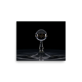 'City in a Drop' — a Surrealism print. A macro view of a water droplet splashing, containing an inverted reflection of a glowing city skyline at night.