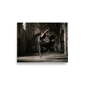 'Grace in the Ruins' — a Art photography print. A photograph of a dancer leaping gracefully in a dark flowing dress inside a ruined stone building, bringing a sense of movement to a Living Room or Studio.