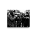 'Deafening Silence' — a Art photography print. Black and white photograph of a man shouting into a megaphone while the surrounding crowd ignores him to look at their smartphones, fitting for an office or den.