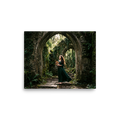 'The Forest Guardian' — a Art photography print. A photograph of a woman in a green dress standing barefoot under ruined stone arches in a forest, bringing a touch of fantasy and nature to a Bedroom.