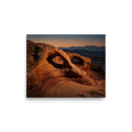 'Desert Whispers' — a Art photography print. A stunning photograph of red sandstone arches in a desert landscape during golden hour, an ideal piece to bring natural warmth to a Living Room.