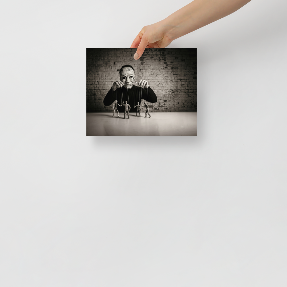 'The Puppeteer of News' — a Surrealism print. Conceptual sepia photograph of a person in a newspaper mask acting as a puppeteer, controlling small human figures on strings against a brick wall, ideal for a moody den or office.