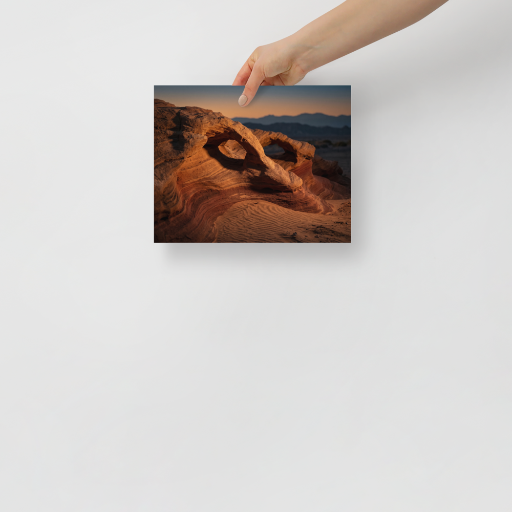 'Desert Whispers' — a Art photography print. A stunning photograph of red sandstone arches in a desert landscape during golden hour, an ideal piece to bring natural warmth to a Living Room.