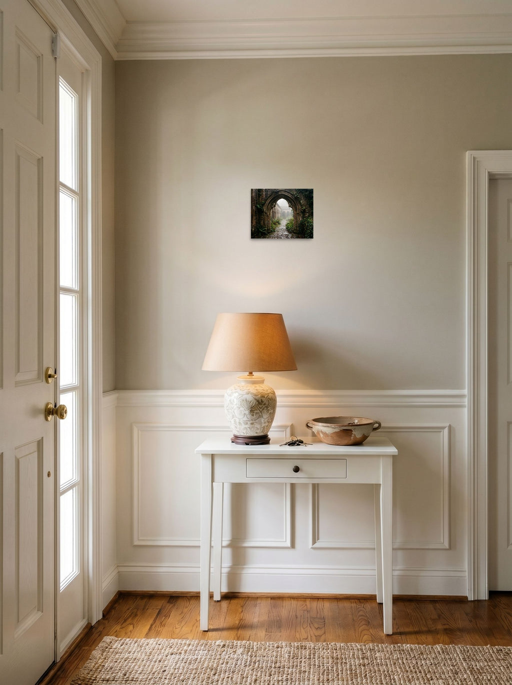 A 10x8 inch unframed paper Art photography print of 'The Forgotten Abbey' hanging in an entryway near a console.