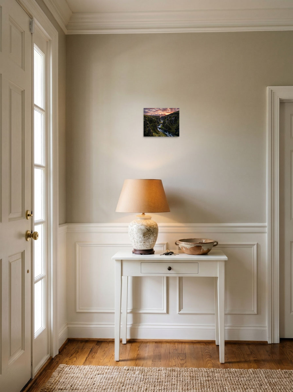 A 10x8 inch unframed paper Art photography print of 'Canyon of the Dawn' hanging in an entryway near a console.