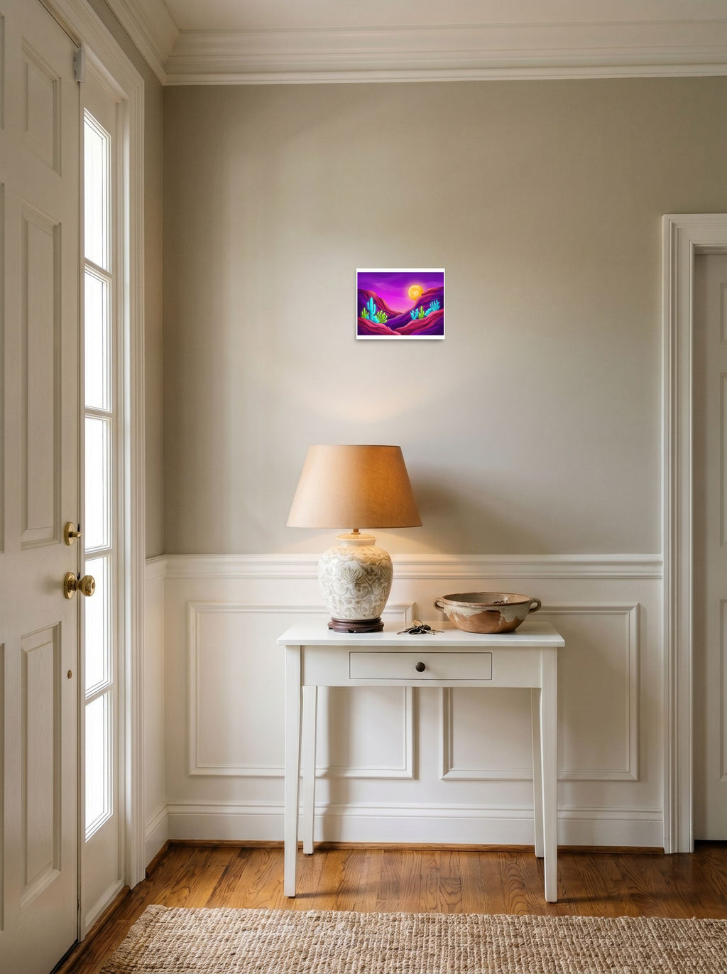 A 10x8 inch unframed paper Surrealism,Psychedelic art print of 'Bioluminescent Desert' hanging in an entryway near a console.
